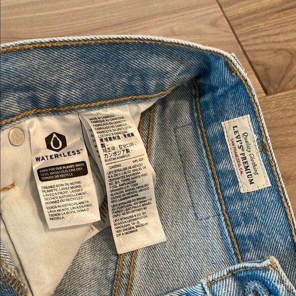 Levi's 501 Light Blue Distressed Jean Shorts - Picture 2 of 6